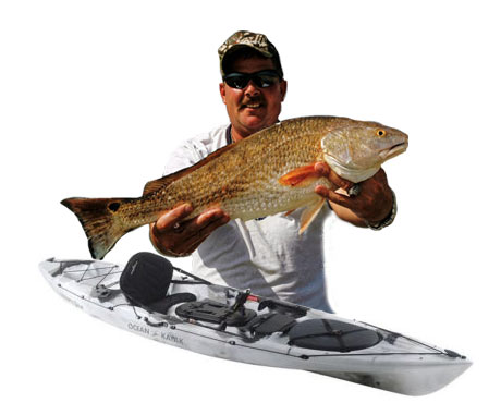 man holding fish he caught on kayak
